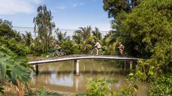 Verdant landscapes cycling along the Mekong Delta | Lachlan Gardiner