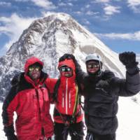On Chapayev Peak with Khan Tengri in the background | Warren Townsden