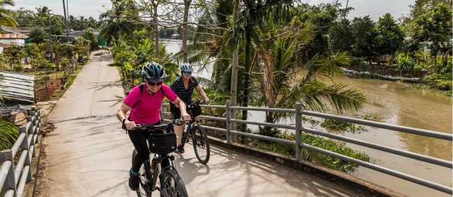 Cycling along the vibrant Mekong Delta | Lachlan Gardiner
